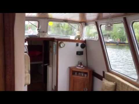 Cream and green Dutch barge