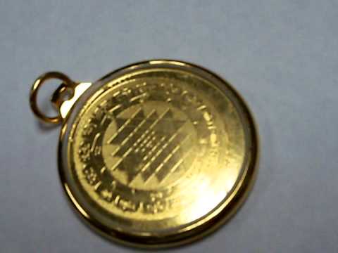 Gold sri yantra pendant
