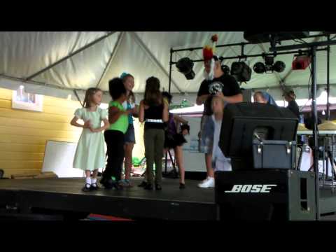 Ellie and kids dancing at fair