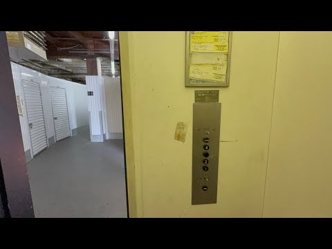Epic Vintage Montgomery Black Button Hydraulic Elevator at Nalley Valley Storage Tacoma WA