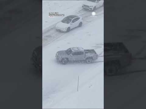 California Highway Patrol Pushes & Pulls Cars Out of Snow