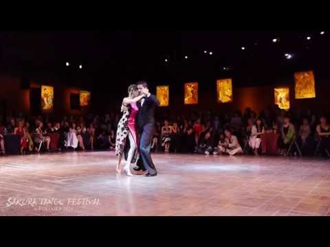  Agustina Berenstein  and  Rodrigo Palacios  are  dancing  to  the  vals  "  Aroma de Amor  "  by  Rodolfo Biagi  at  Sakura Tango Festival  in  2014