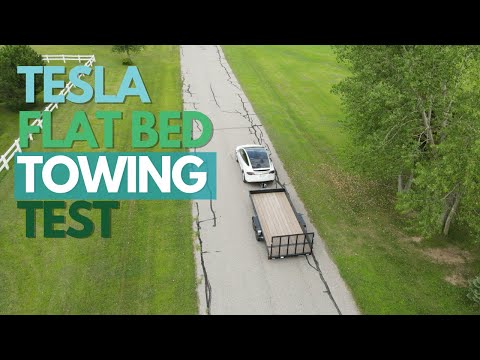 TESLA TOWING A FLATBED WITH A TESLA | EV TOWING