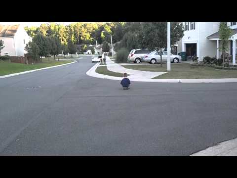Pushing the kids on a skateboard