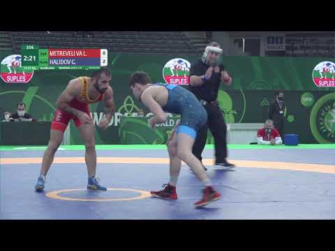 Qual. FS - 57 kg: L. METREVELI VA (ESP) v. G. HALIDOV (HUN)