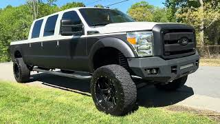 Six door stretched F350 custom built lifted diesel pick up with carbon fiber