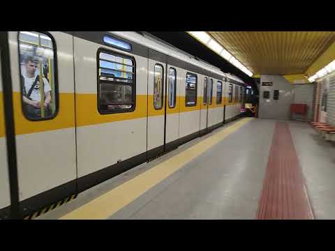 ATM Series 8000 Milan Metro train departing Maciachini