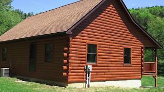 Liberty Log Finishing Re-staining A Log House