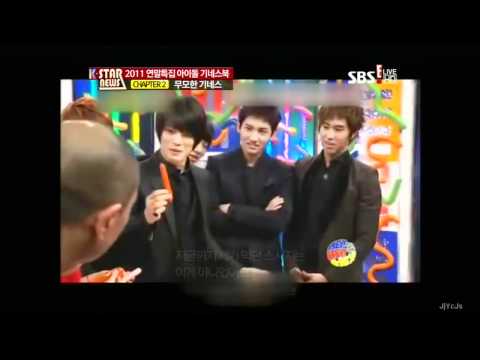 111227 JYJ Jaejoong makes it in 'SBS Idol Guiness Book of Records' sausage peeling skills