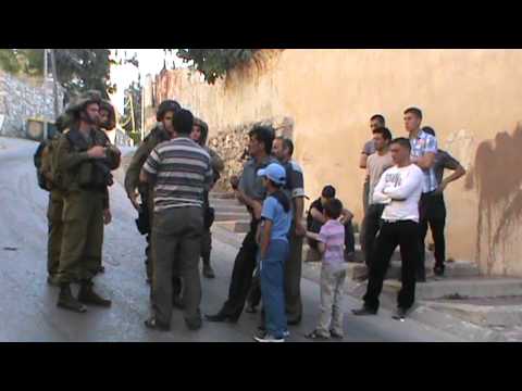 Soldiers preventing journalists from filming in Shuhada Street