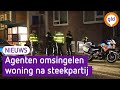 Gewonde door steekpartij, politie omsingelt huis