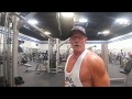 Coach Bill is showing how he does wide grip lat pull downs cable machine