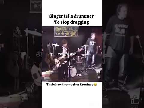 OMG see how this drummer f!ght woman singer right on stage.