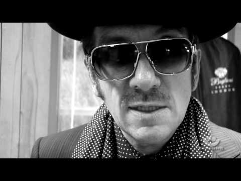 Thumbnail for Elvis Costello - Backstage Interview (2009 Exclusive) by Elvis Costello