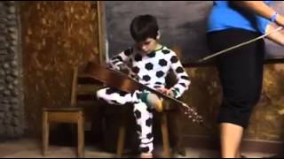 Autistic Boy Plays Robert Johnson Blues (Me & the Devil Blues)