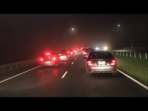 Flooded motorway halts Auckland traffic on Sunday night