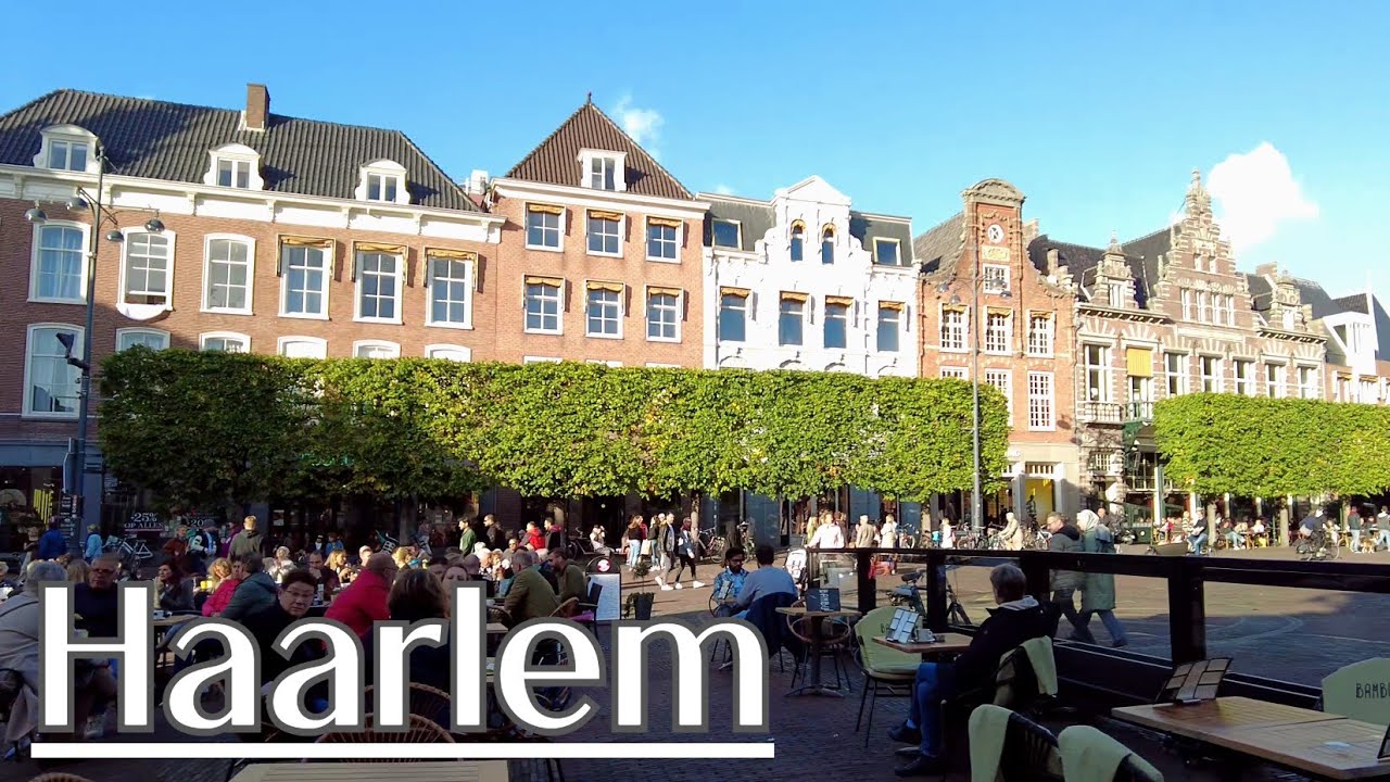 Immersive street-level walking tour through Haarlem Grote Markt, Netherlands, showcasing authentic urban landscapes, local architecture, and the vibrant atmosphere of the city's neighborhoods