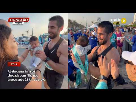 Vídeo: Atleta cruza linha de chegada com filho nos braços após 21 km de prova.