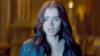 Джейми Кэмпбелл Бауэр и Лили Колинз в фильме "Город костей"