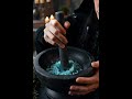 Witch Grinds Iridescent Opal in Mortar & Pestle!