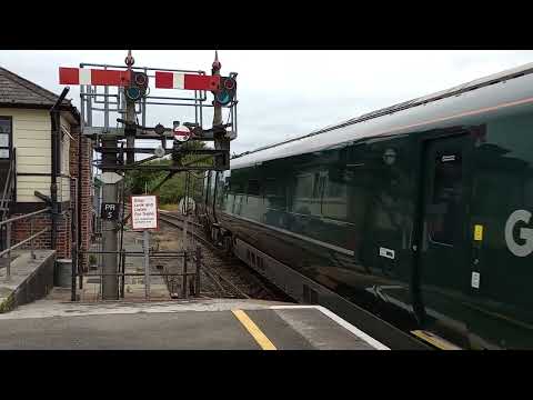 UK Trains.  A GWR Class 802 IET and semaphore signals on the Newquay branch line.