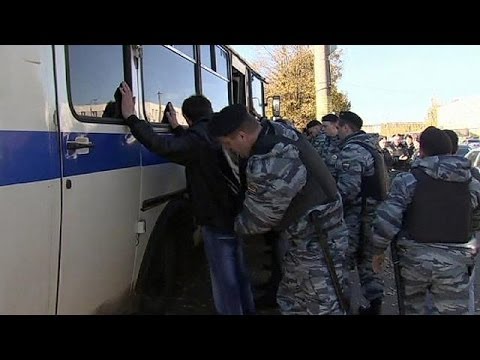 Russian police round up migrants in wake of Moscow riot