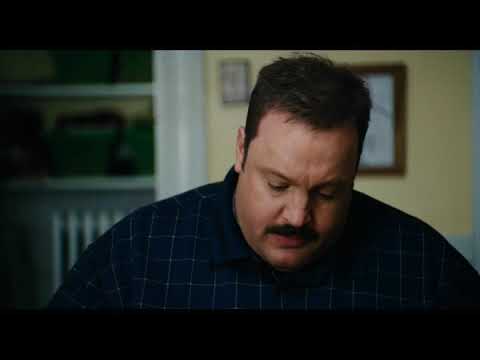 Trailer frame with Paul Blart confronting thieves, music punching the cut