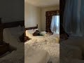 Murphy Kids Jumping On Bed In Hotel