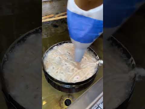 Making the biggest funnel cake I’ve ever seen!