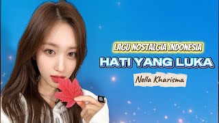 Download lagu 'LAGU NOSTALGIA INDONESIA POPULER' Nella Kharisma - Hati Yang Luka Video Lyric Music) mp3