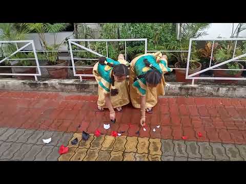 Enjoying paper boats in water by Hamsika and Hamsini