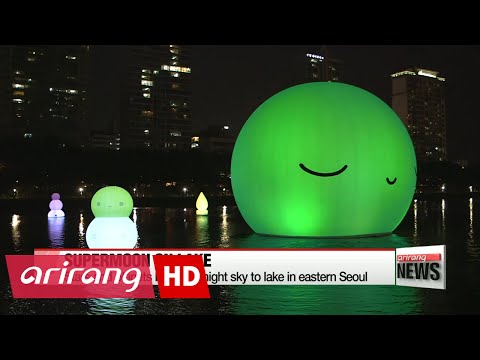 Making Chuseok wishes upon 'Supermoon' at Seokchon Lake