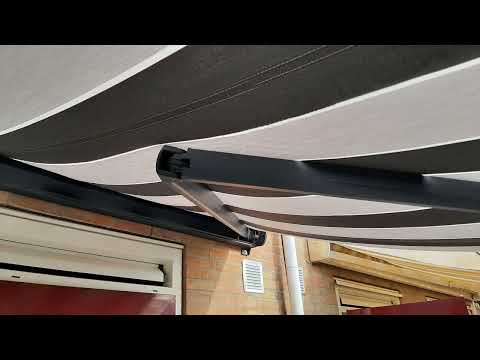 "PASOP"  Splinter Nieuw  Zonwering Rainbow Ibiza Plus Knikarmscherm Voldoet Niet