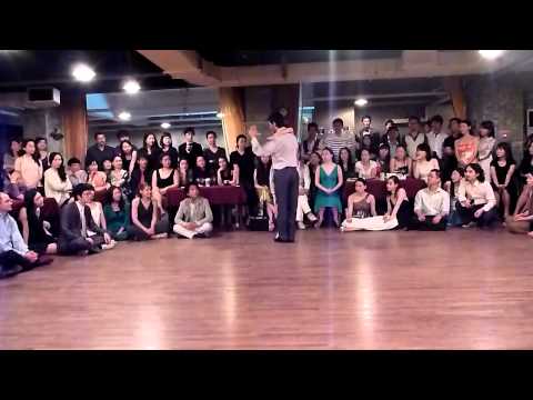  Andrea Misse  and  Javier Rodriguez  are  dancing  to  the  tango  "  En Esta Tarde Gris  "
