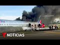 Hablan los pasajeros del avión incendiado en Miami | Noticias Telemundo