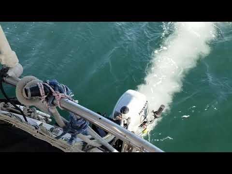2 HP Honda outboard pushing a 41.5 ft long sailboat