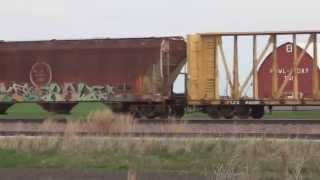 preview picture of video 'Lots of old Missouri Pacific hoppers on Union Pacific manifest at Jordan, Iowa'