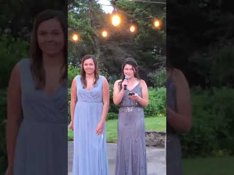 Bethany Rees gives a toast to Hannah Hughes and Tyler Shaum.