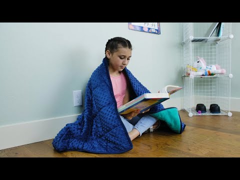 Slide 7 - Bouncyband Portable Weighted Blanket, 7lb, 36" x 56" (video)