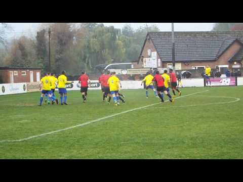 HULLBRIDGE'S PIBWORTH HEADS BRINKLOW'S CENTRE OVER THE BERKHAMSTED CROSSBAR