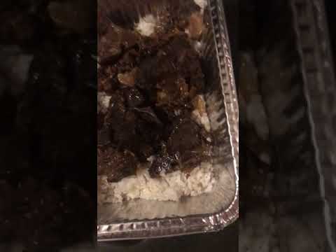 Lamb chops with gravy over rice dinner