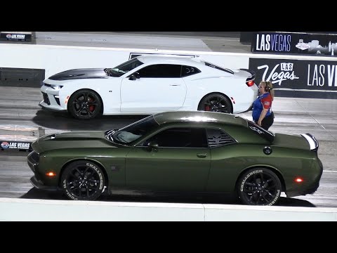 Thumbnail for Dodge Challenger vs Camaro SS - muscle cars drag racing by Dodge, Car, Muscle car