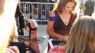 Fiona Shaw From Harry Potter and Marnie on True Blood signs autographs for fans at the true blood season 4 premiere