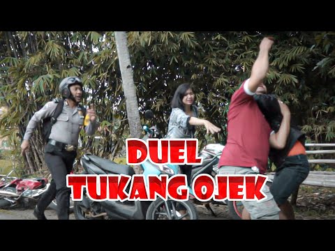duel-tukang-ojek-pak-bhabin-polisi-motret