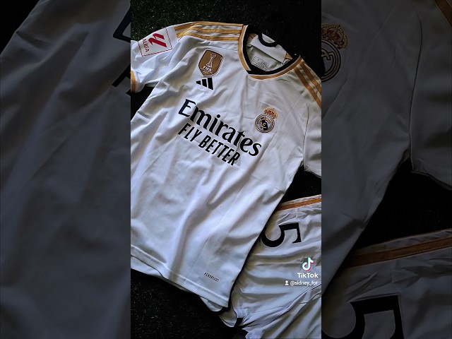 Vídeo relacionado con Real Madrid FC Rm3go19, Adultos Unisex Blanco/oro, Talla Única