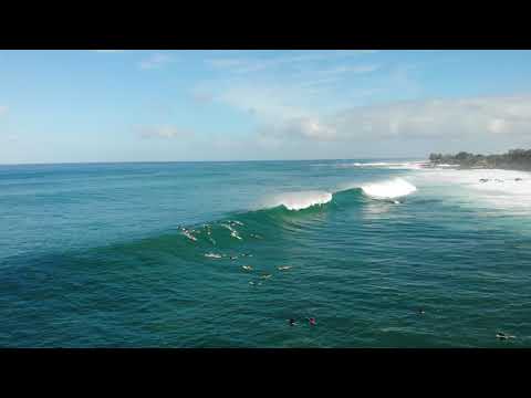 Aerial shots of Waimea Bay and surfers