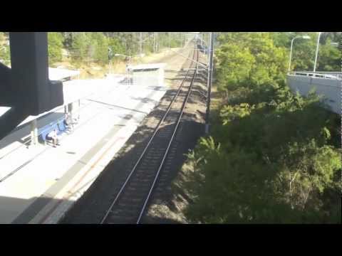 CountryLink 2805 passing through Holsworthy Station, City-bound