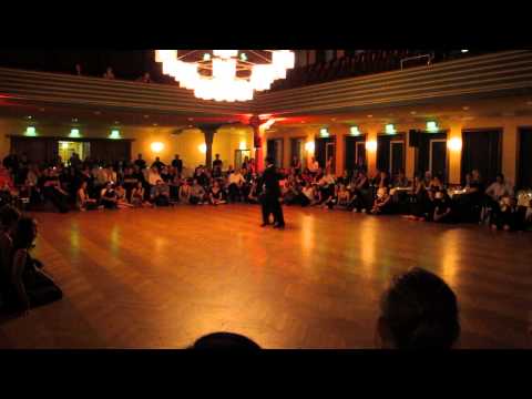  Sebastian Achaval  and  Roxana Suarez  are  dancing  to  the  tango  "  Estampa De Varon  "  by  Juan D'Arienzo  at  Festivalito Tango Primavera  in  2014