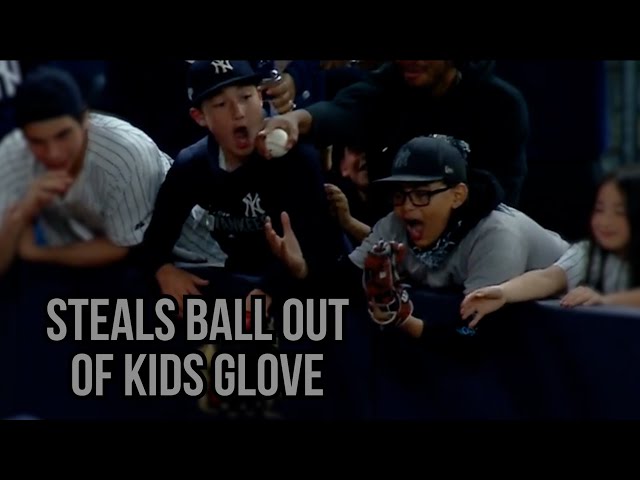 Judge tries to give ball to kid but another fan steals it, a breakdown