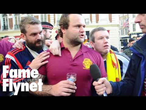 Scottish Football Fans Enjoy A Drink After An Armistice Day Service In Trafalgar Square